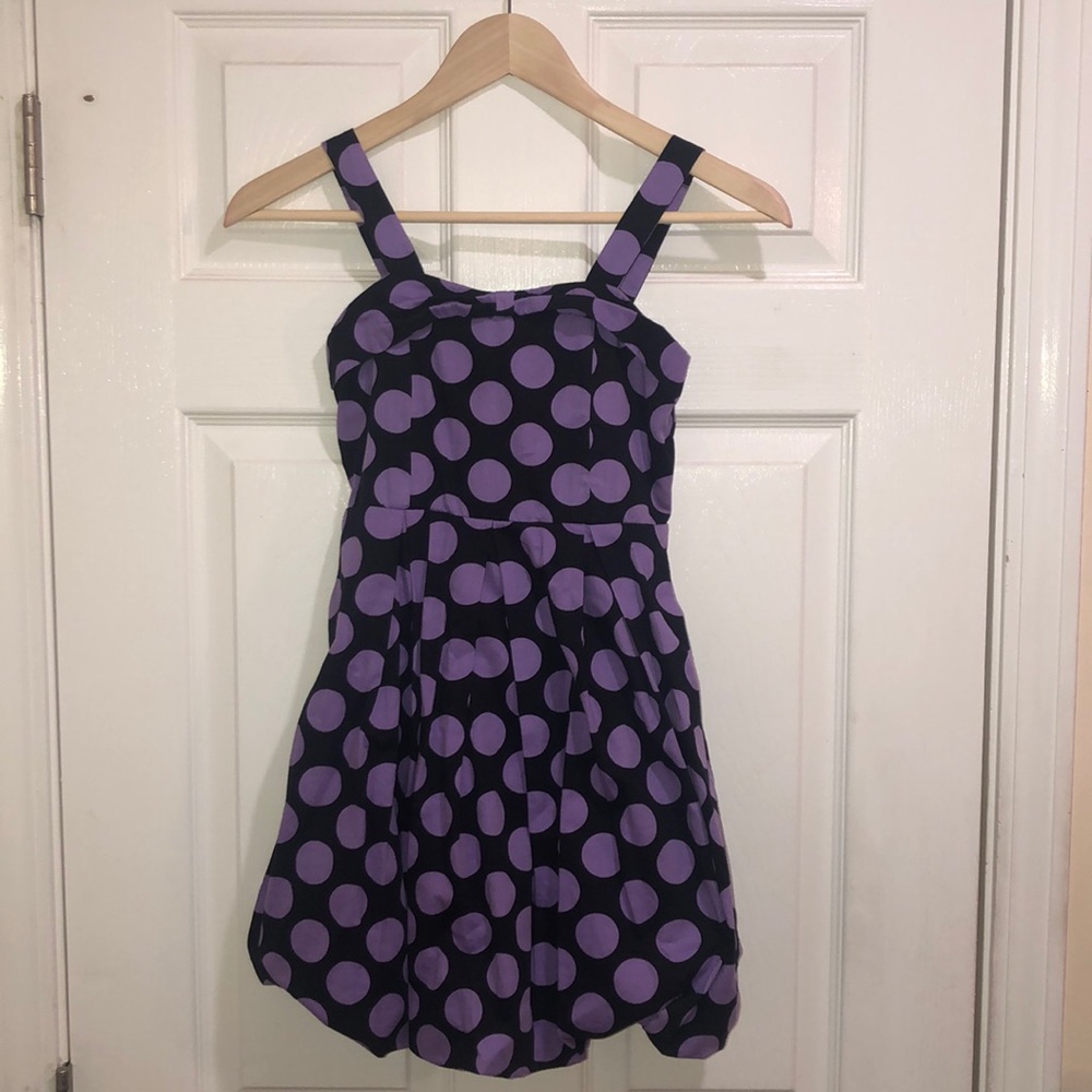Purple polka dotted black dress